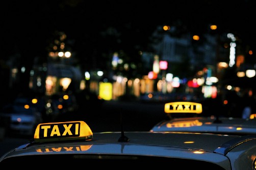 Taxi sign - Unsplash